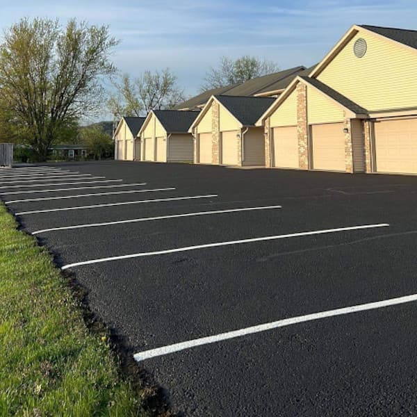 apartment complex parking lot with new sealcoating and striping